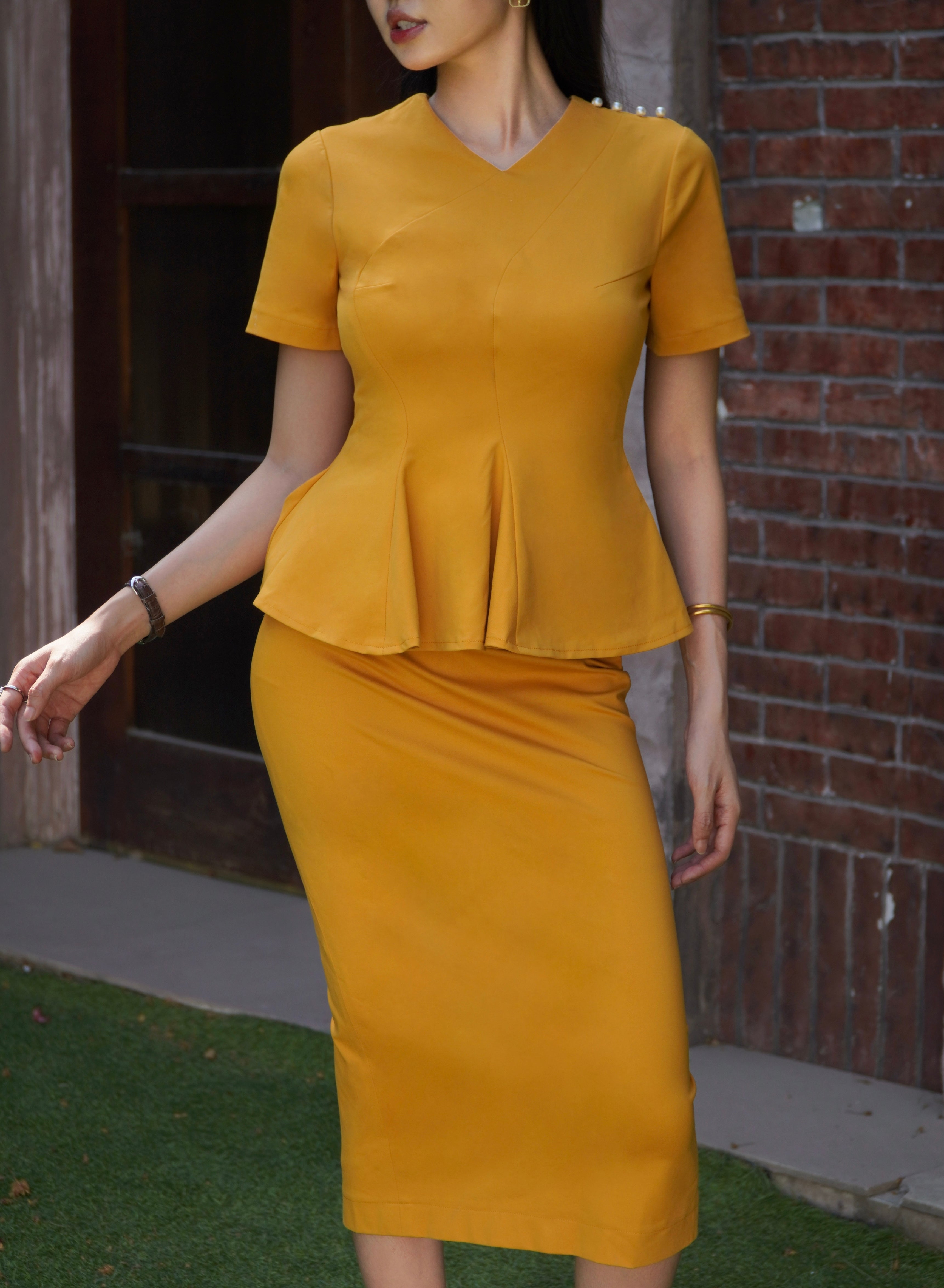 Curved Panel Peplum Top