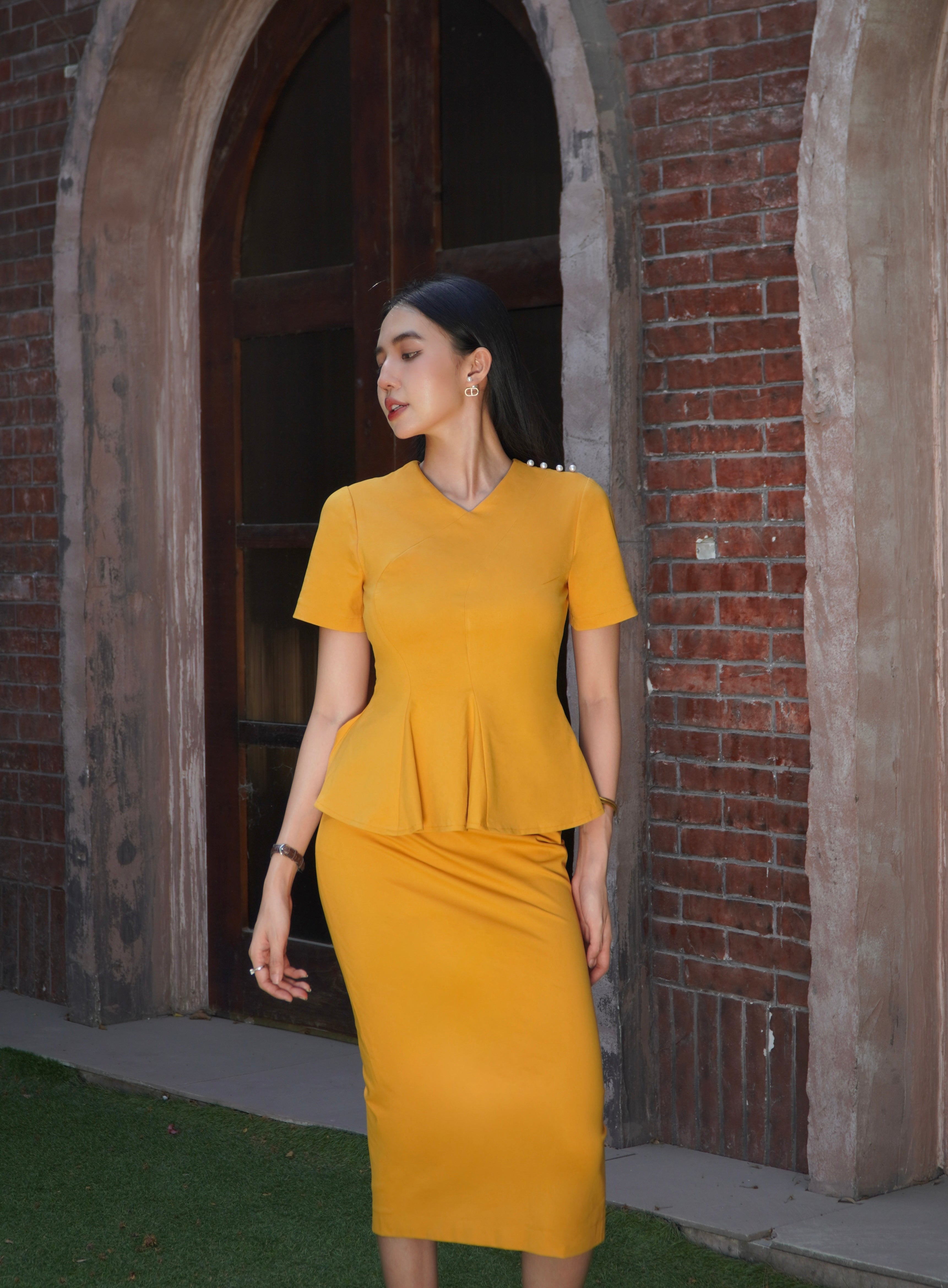 Curved Panel Peplum Top